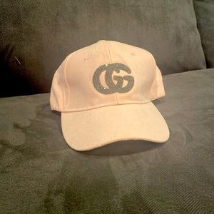 GG pink suede hat.